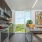 a kitchen with a table and oven