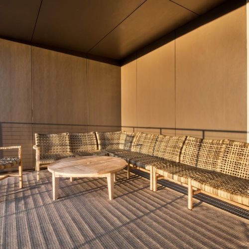 Access to resident-only features a deck with chairs and a table