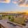 a view of a parking lot and a sunset