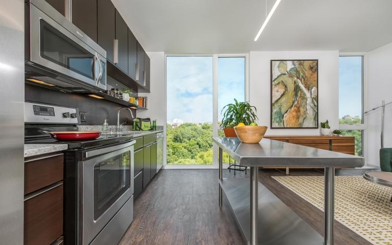 a kitchen with a table and oven